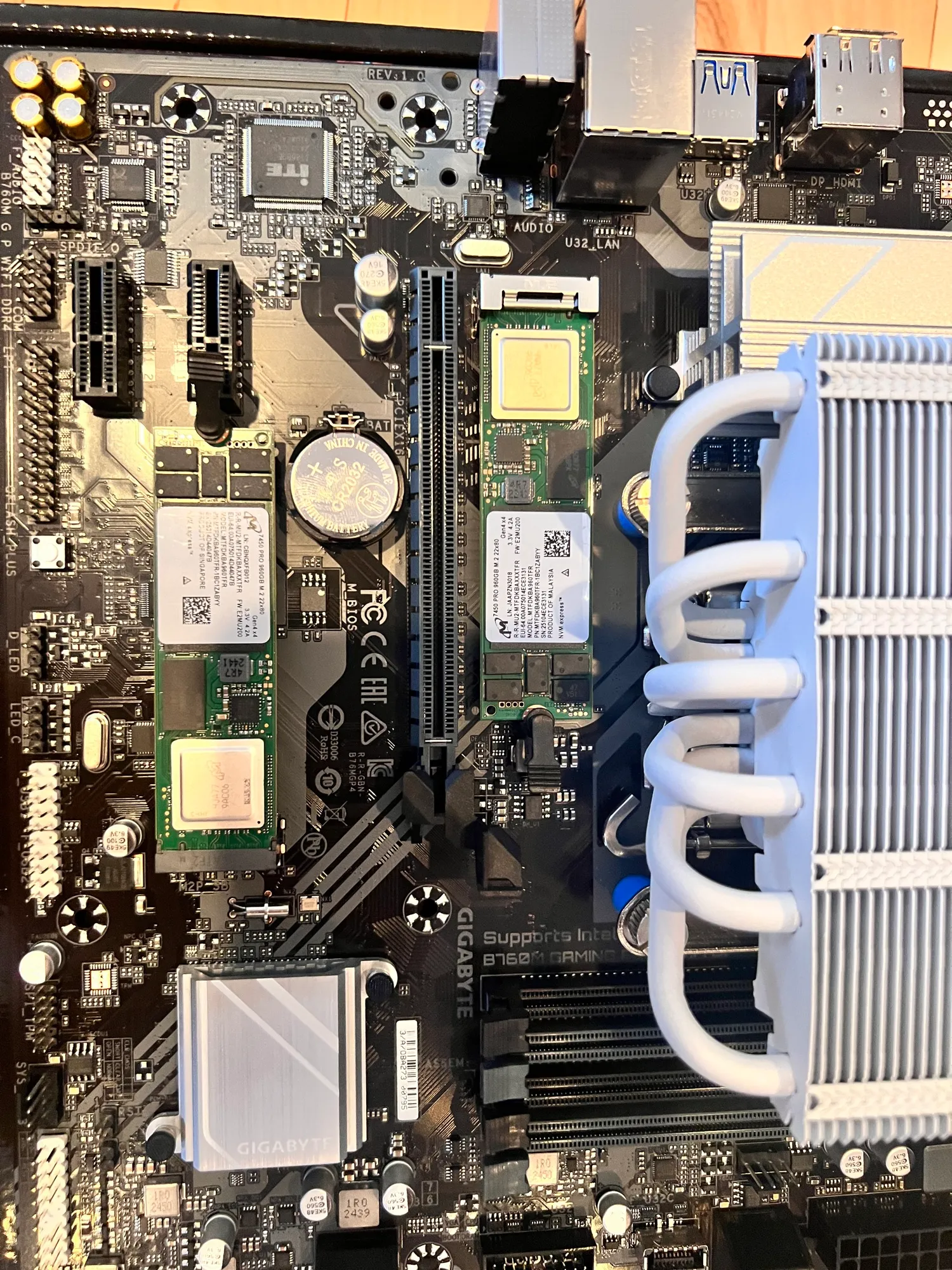 Both Micron 7450 PRO drives in the board's two M.2 slots