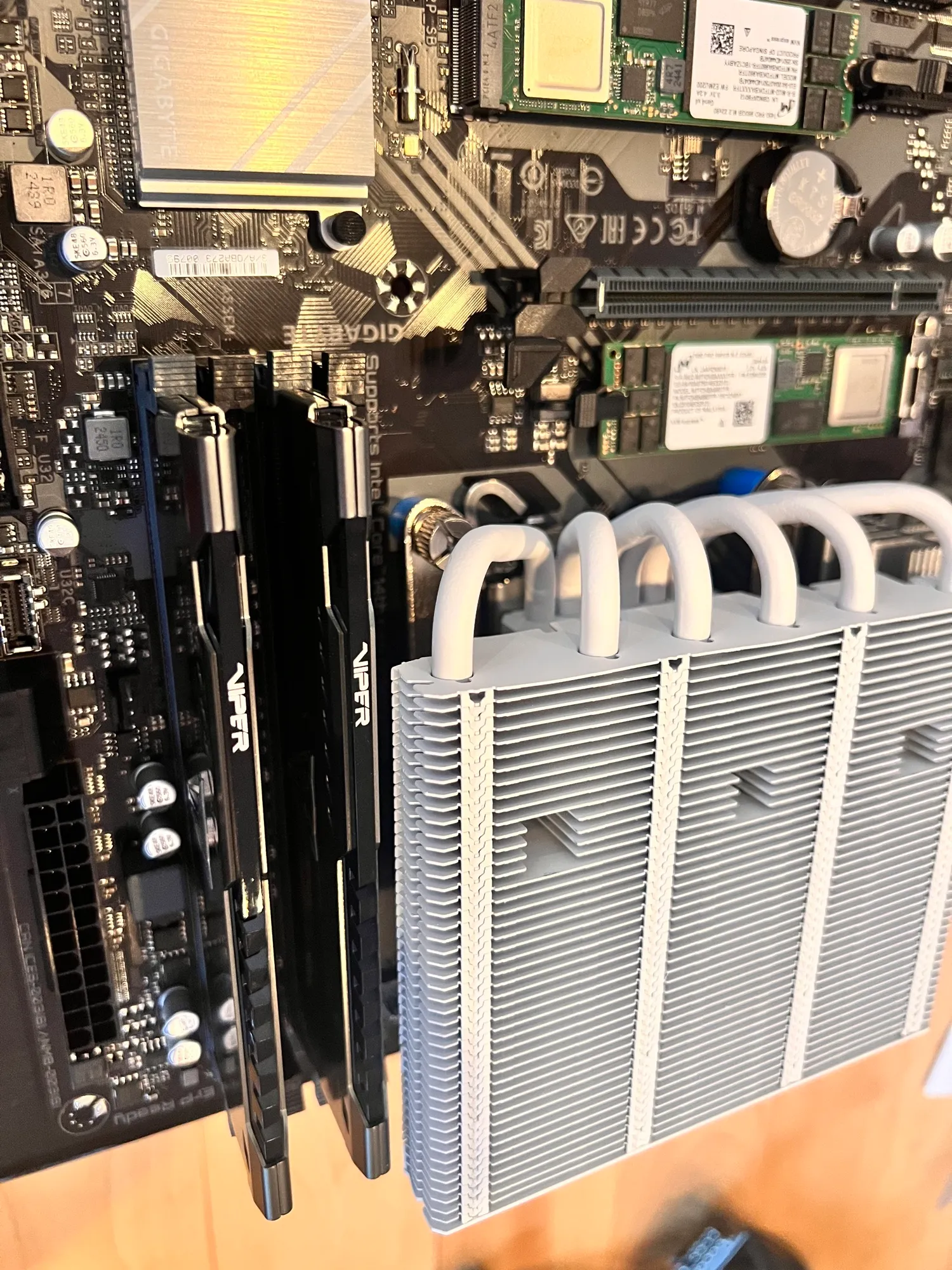 Both sticks seated next to the cooler towers